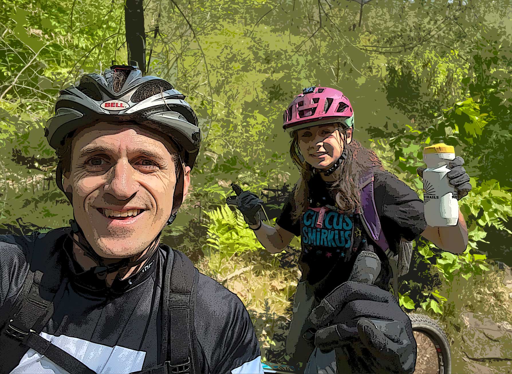 Jamison and Madeline posing in helmets at Kingdon Trails